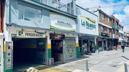 Supermercados Lo Nuestro San Cipriano — foto