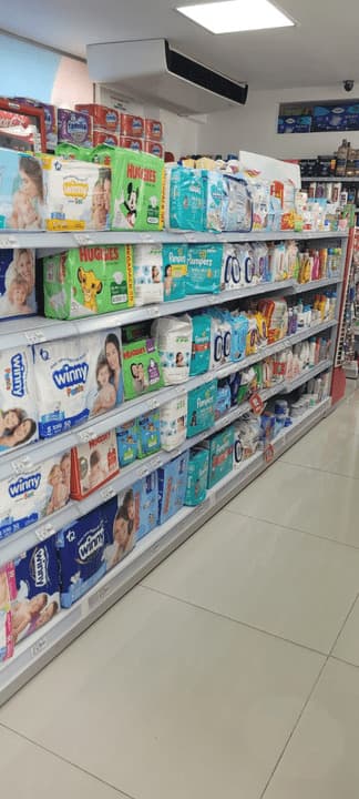 la rebaja Plus No. 1 DROGUERIA Y MINIMARKET El Triangulo Manizales — foto