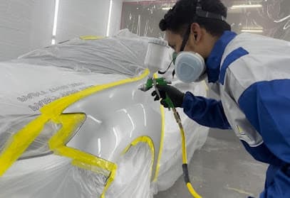 Dad's Garage Spa, pintura y latonería automotriz — foto