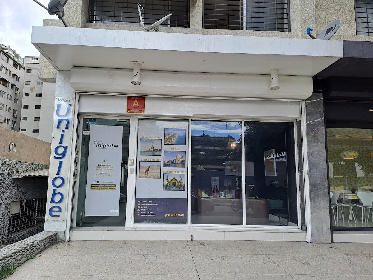 UNIGLOBE Viaja Contigo — foto